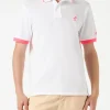 Polo in piquet bianco con ricamo palme