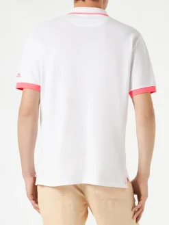 Polo in piquet bianco con ricamo palme